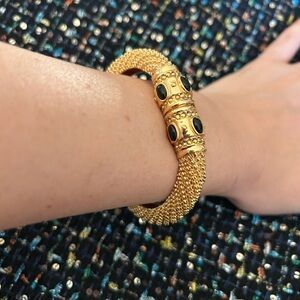 vintage St. John Gold Tone Camper bangle Bracelet with Black Cabochons